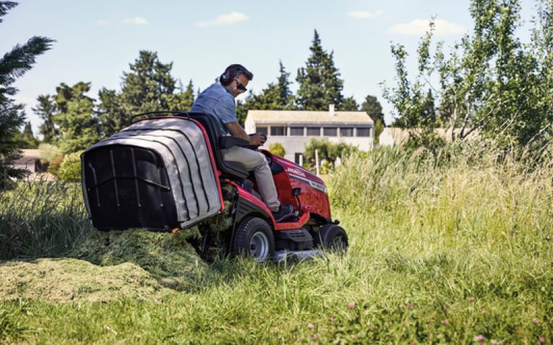 HF Ride On Mower Model Dumping Grass